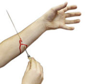 Voodoo Needle Through Arm